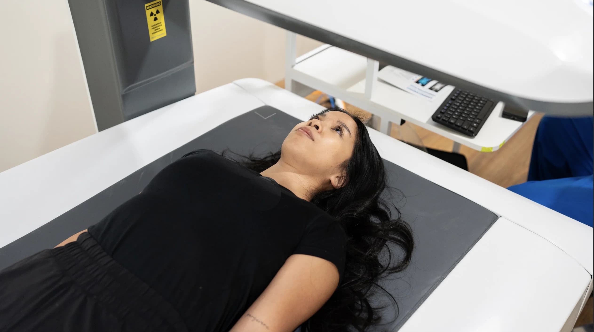 Patient undergoing DEXA body composition scan at Simba Health